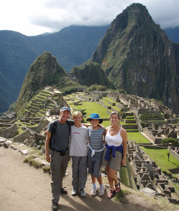 My family standing in front of famous Incan ruins Machu Picchu